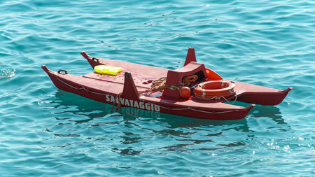 life-boat in the water, close to the beach resort