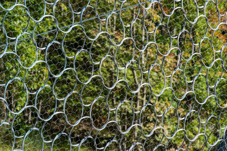 wire containment mesh repair constructed for the passage of vehicles by landslides