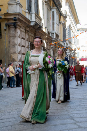 GENOA, ITALY - 8 JUNE 2014 - Unidentified people during the historical parade of the Maritime Republics Palioのeditorial素材