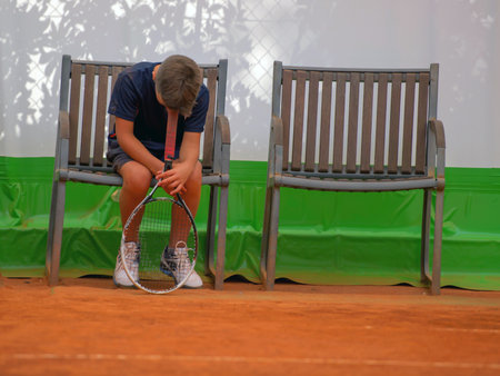 Children at school during a dribble of tennisの写真素材