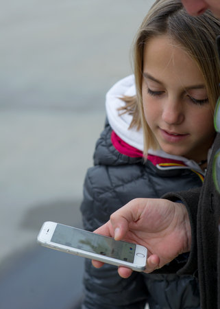 reading a message on smartphoneの写真素材