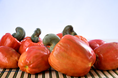 Cashew nuts isolated on bamboo backgroundの写真素材