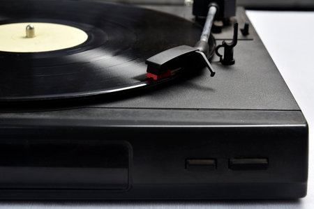 old vinyl record player on white background.の写真素材
