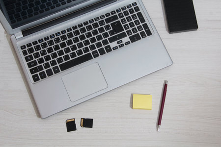 notebook on the table with notepadの写真素材