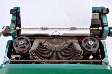 antique green typewriter, analogical typing