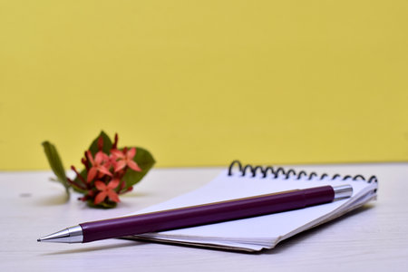 notebook on the table with notepad.
