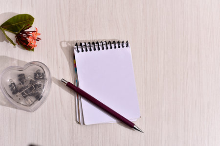 notebook on the table with notepad.