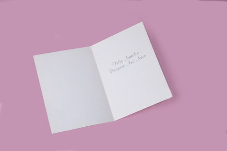 card written merry christmas in portuguese on pink background to write messagesの写真素材