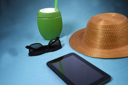 Traveler's accessories, sunglasses for summer with empty space for text. Travel vacation concept. Summer background. Road frame set. Lay flat, top view.の写真素材