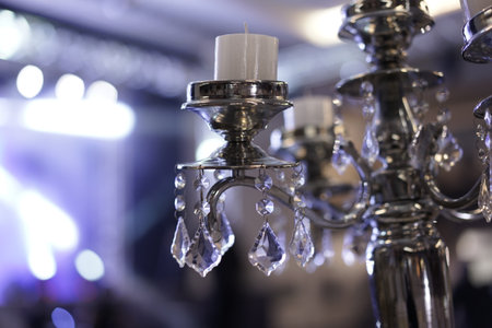 luxurious chandeliers with natural lighting on blurred background;の写真素材