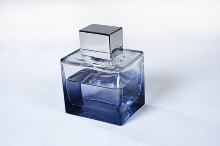 square glass bottle for perfume isolated on white background;
