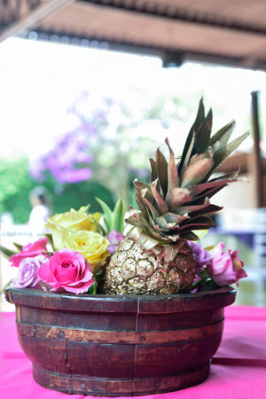 beautiful decorative arrangement of natural flowers on the table on blurred backgroundの写真素材