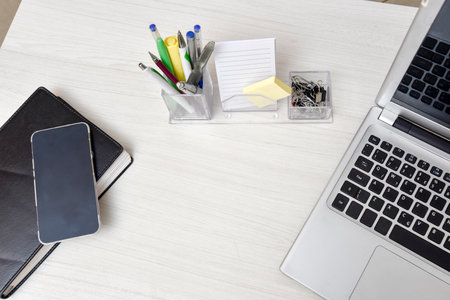 home office desk or notepad, note book, pens, used for work and distance learning with pens, EAD.