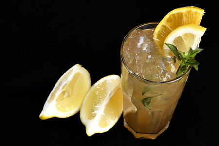 natural cinnamon tea, cloves, rosemary and lemon grass bured backgroundの写真素材