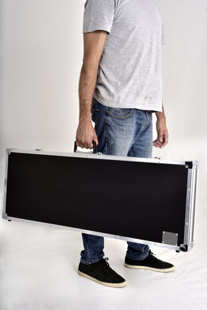hard case for musical instruments, photo with details and blurred dots isolated on white background