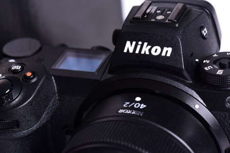 Nikon Z6 II (version 2) camera photograph confrontation and competition between cameras. White background. The best mirrorless cameras from top brands.のeditorial素材