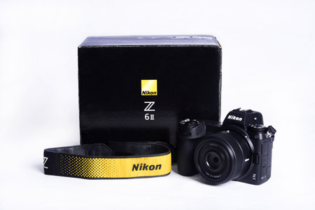 Nikon Z6 II (version 2) camera photograph confrontation and competition between cameras. White...