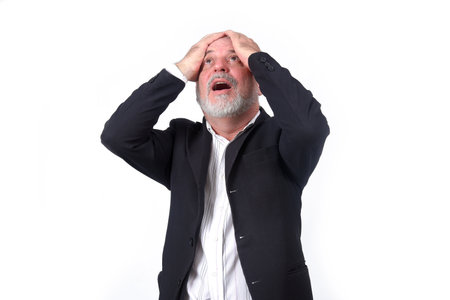 adult man using "SeniorLife" tablet notebook cell phone communication technologyの写真素材