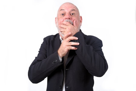 adult man using "SeniorLife" tablet notebook cell phone communication technologyの写真素材