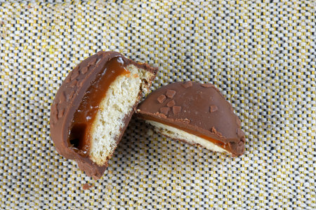 chocolate bonbon with dulce de leche delicious caramel sugar filling isolated caloric taaste foodの写真素材