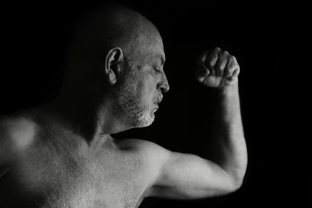 adult man facial and body expression black and white photo silhouette art composition imageの写真素材