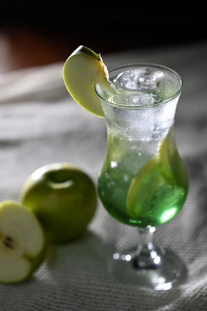 refreshing drink with green apple fruits and syrup preparing an alcoholic drink barの写真素材