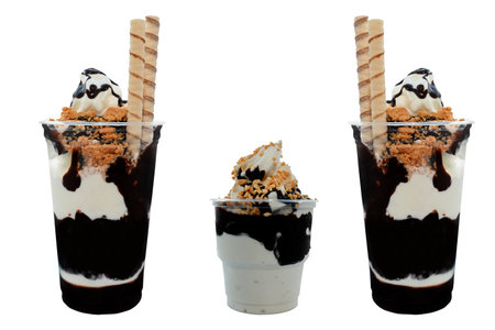 Panoramic still life of colorful frozen fruit granita drinks flowing in plastic takeaway cups with ice cream straws tasteの写真素材