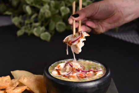 ceviche raw fish food with lemon onion pepper and lemon, healthy food tasteの写真素材