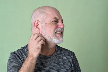 portrait adult man bald white beard face expression happy thoughtful male model gentleman in black clothes image.の写真素材