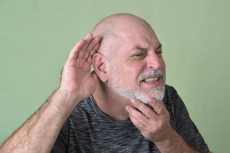 portrait adult man bald white beard face expression happy thoughtful male model gentleman in black clothes image.の写真素材