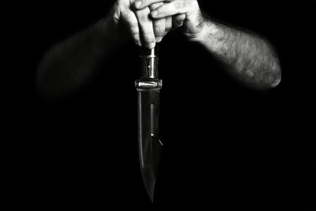 man wielding make expressively holding cutting metal blade black and white photo art expression...