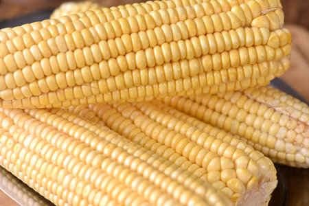 corn natural food healthy delicious vegan cooked green corn on wooden table taste