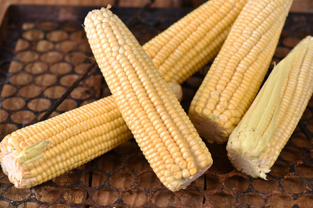 corn natural food healthy delicious vegan cooked green corn on wooden table taste