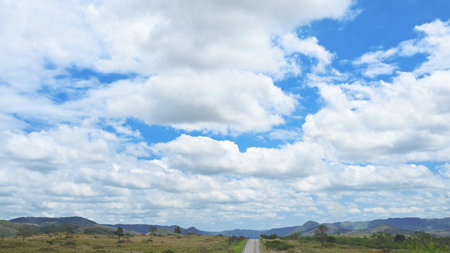 blue sky with white clouds beautiful day texture background imageの写真素材