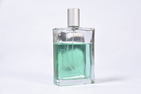 perfume bottle with liquid black glass scented aroma Fragrance Scent Flavor isolated on white...