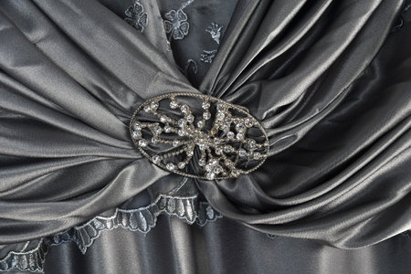 wrinkled crumpled silver gray fabric with embroidery use for texture background with space for textの写真素材