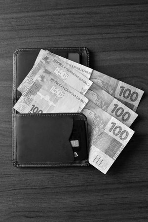 GoiÃ¢nia, Brazil, September 17, 2025: Financial value of dollar and Brazilian real banknotes.