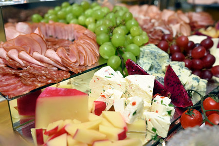 dining table with assorted foods, party foods