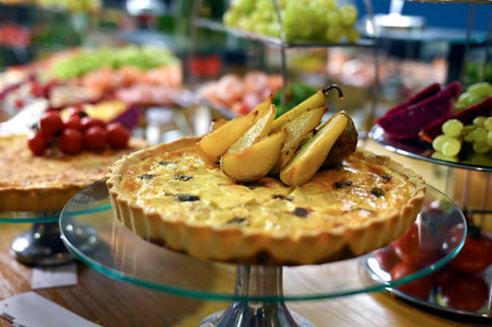 dining table with assorted foods, party foodsの写真素材