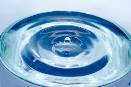 little water drop in a glass sharp