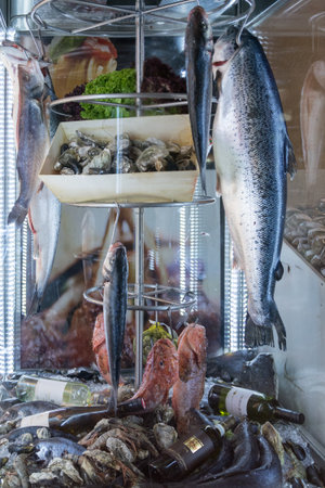 frozen fish with a little bit of alcohol at a market in Viennaの写真素材