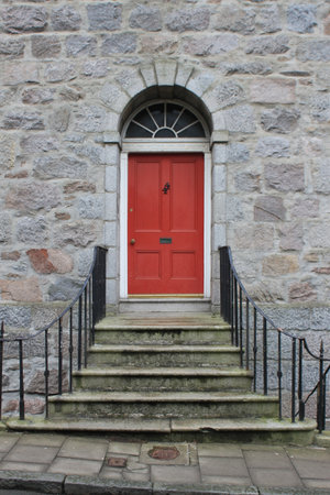 stairs to red doorの写真素材