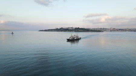 Aerial drone ferryboat traveling Bosphorus Istanbulの写真素材