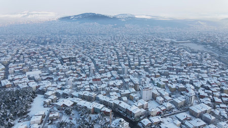 Aerial urban city winter snow