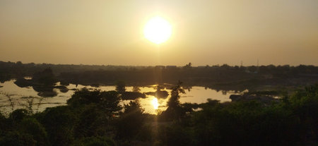 Beautiful sunset over the river in India.の写真素材