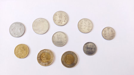 All Indian coins in single frame. Ariel view of Indian currency coins on white backgroundの写真素材