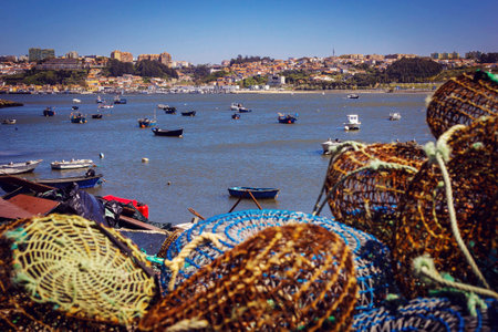 Fishing traps and anchored boats in Porto, Portugalのeditorial素材