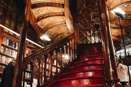 PORTO, PORTUGAL - APRIL 28, 2016: Staircase at the Lello Irmao bookstore, one of the oldest and most beautiful bookstore in the worldのeditorial素材
