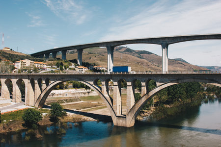 Bridges over Douro river in Peso da Regua in Alto Douro Wine Region, Portugalの写真素材