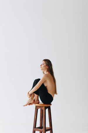 Topless young caucasian woman on white backgroundの写真素材